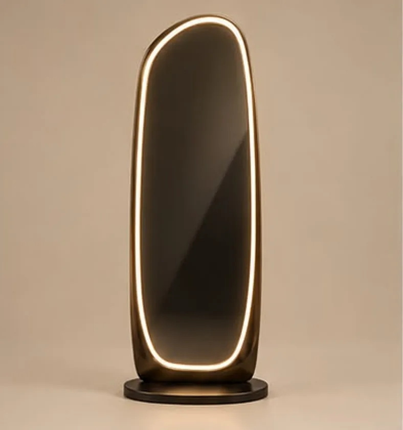 The mirror from the front: smoked glass ringed by warm light in a bronze body, on a dark round base